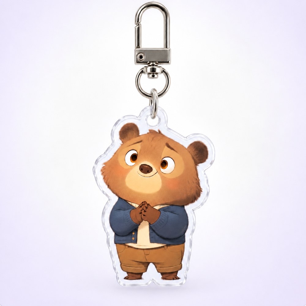 Finished clear acrylic bear keychain assembled with a silver D-ring clip and connector ring