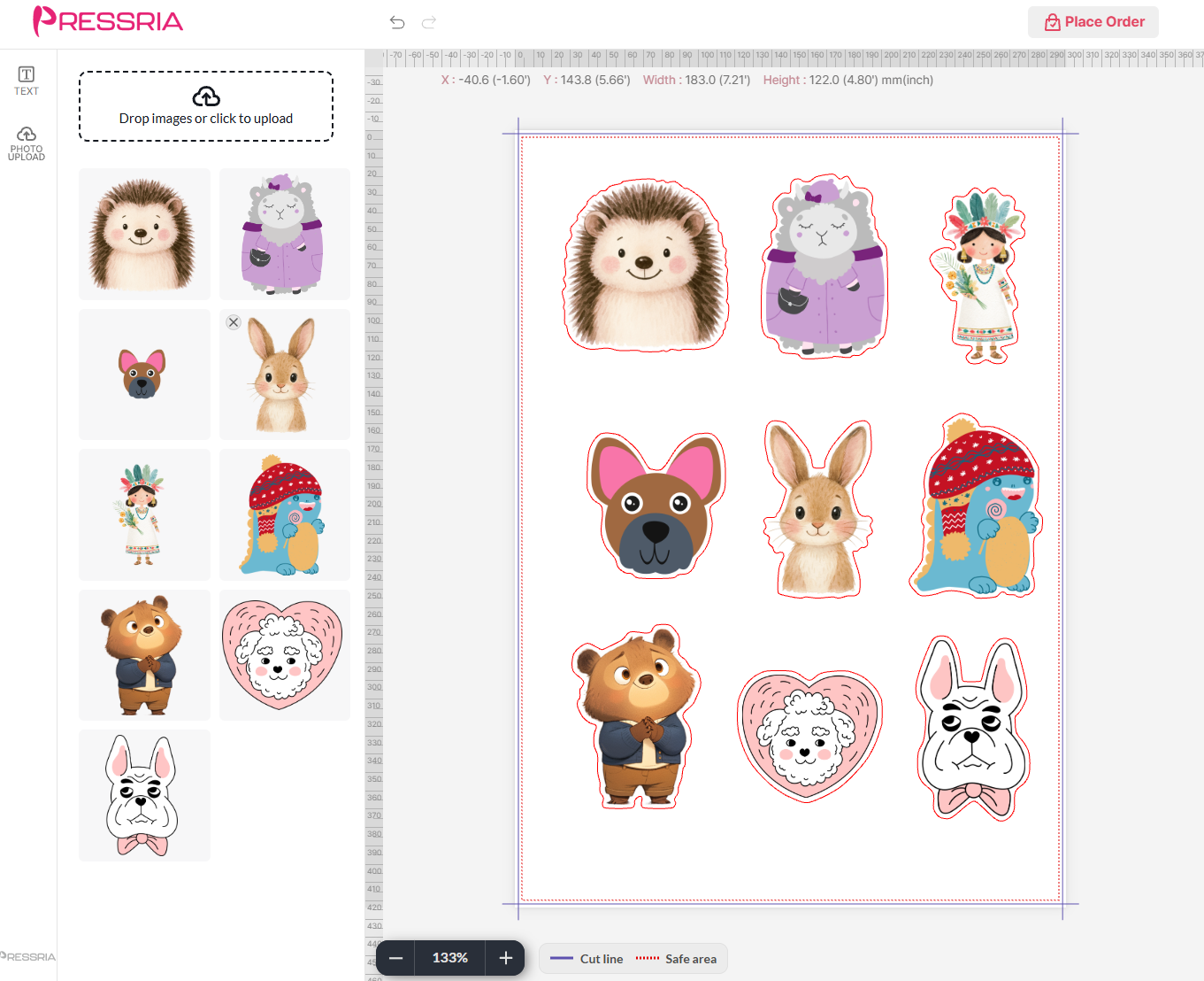 The free-form sticker editor: nine uploaded images placed on a sheet, each with a cut line traced around its outline, the safe area shown as a dotted line inside the page edge.